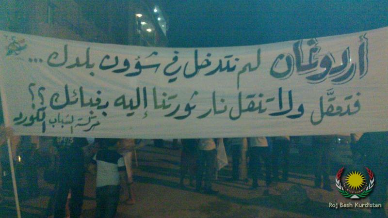 a kurdish banner toward Erdogan