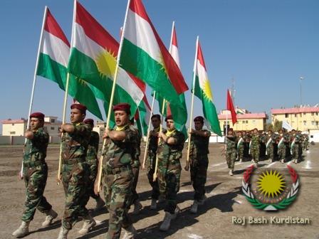 Peshmerga march with Kurdistan Flags